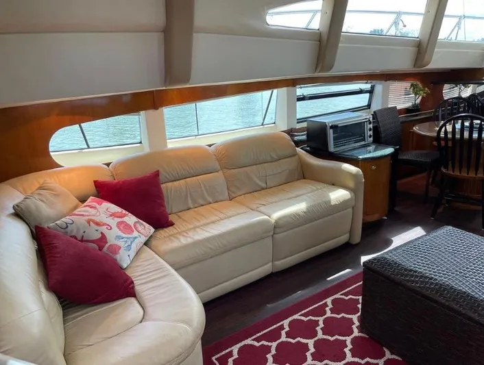  Yacht Photos Pics Luxurious interior of 2000 Carver 506 Motor Yacht with leather seating and elegant decor.