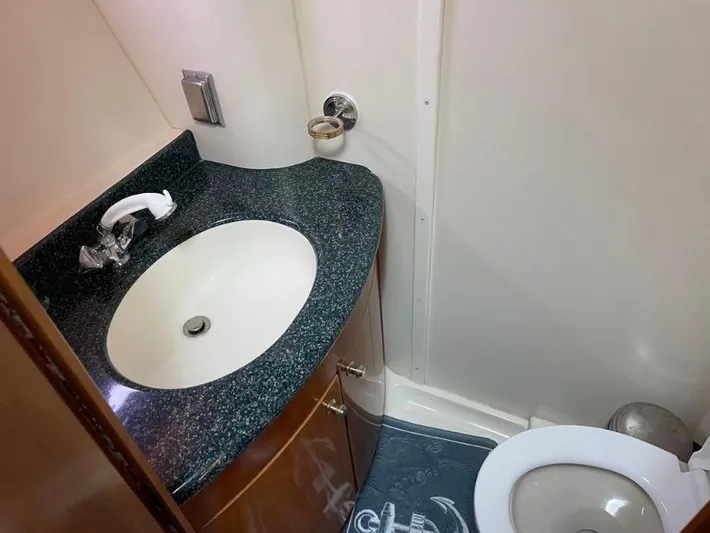  Yacht Photos Pics Bathroom interior of 2000 Carver 506 Motor Yacht with sink and toilet.