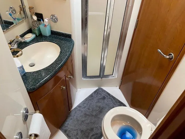 Yacht Photos Pics Bathroom in 2000 Carver 506 Motor Yacht with sink, toilet, and shower.