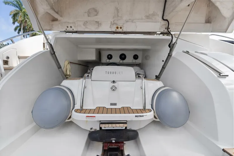 Above Deck Yacht Photos Pics 2018 Princess S60 yacht with Turbojet tender in storage compartment.