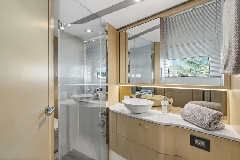 Above Deck Yacht Photos Pics Luxurious bathroom in 2018 Princess S60 yacht with modern fixtures and elegant design.