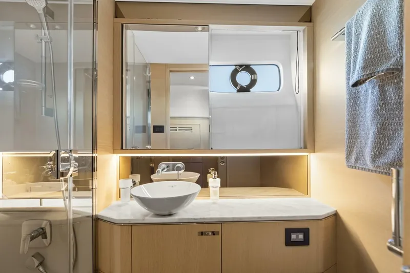 Above Deck Yacht Photos Pics Luxurious bathroom in 2018 Princess S60 yacht with modern fixtures and elegant design.