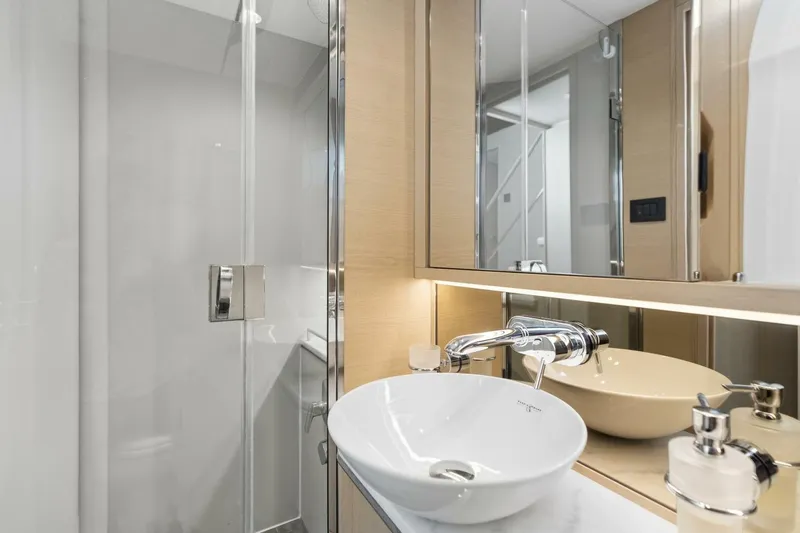 Above Deck Yacht Photos Pics Luxurious bathroom in 2018 Princess S60 yacht with modern fixtures and elegant design.