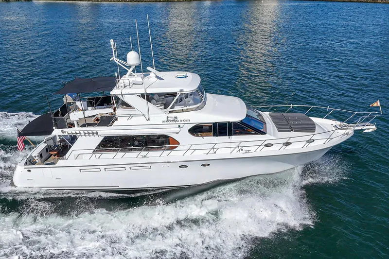 As Good As It Gets Yacht Photos Pics Ocean Alexander 640 Pilothouse yacht cruising on water, 2002 model.