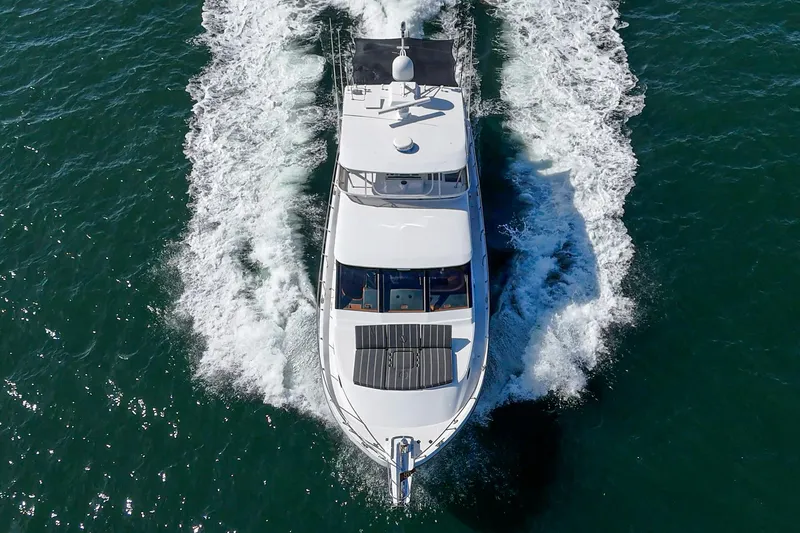 As Good As It Gets Yacht Photos Pics Ocean Alexander 640 Pilothouse yacht cruising on open water, aerial view, 2002 model.
