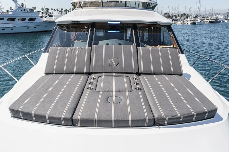 As Good As It Gets Yacht Photos Pics Luxurious 2002 Ocean Alexander 640 Pilothouse yacht with cushioned sunbathing area.