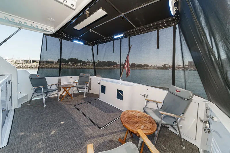 As Good As It Gets Yacht Photos Pics Spacious deck of 2002 Ocean Alexander 640 Pilothouse with seating and ocean view.