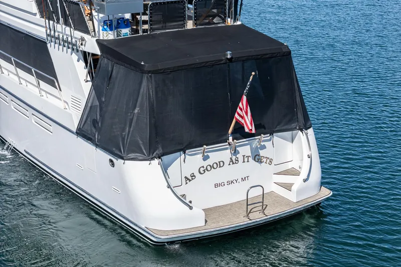 As Good As It Gets Yacht Photos Pics Ocean Alexander 640 Pilothouse yacht, 2002 model, with American flag, named "As Good As It Gets."