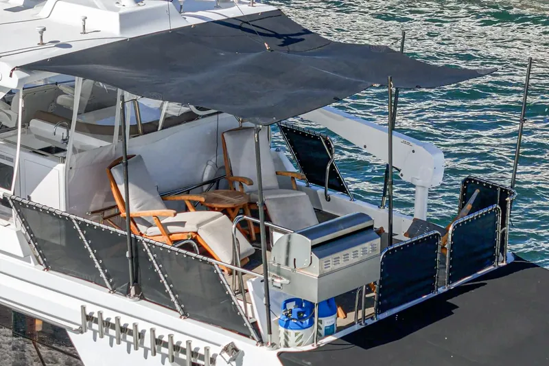 As Good As It Gets Yacht Photos Pics Luxury Ocean Alexander 640 Pilothouse yacht deck with seating and grill, 2002 model.