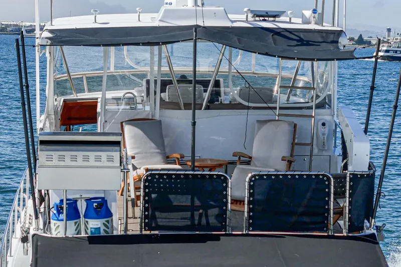 As Good As It Gets Yacht Photos Pics Ocean Alexander 640 Pilothouse yacht, 2002 model, featuring a spacious deck with seating and canopy.