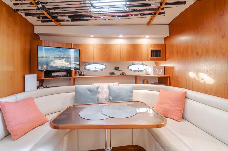 Miss Michelle Yacht Photos Pics Luxurious 1996 Tiara Yachts 4300 interior with cozy seating and elegant wooden finishes.