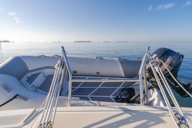 Miss Michelle Yacht Photos Pics 1996 Tiara Yachts 4300 with outboard motor on calm water.