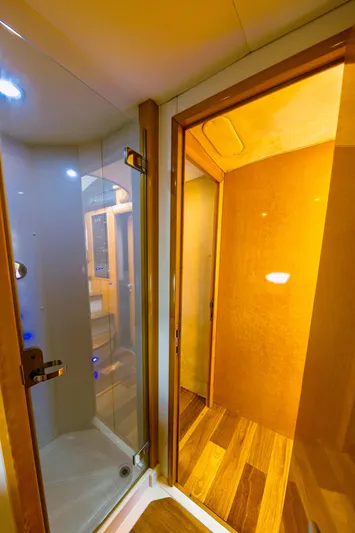 La More Yacht Photos Pics Luxurious bathroom interior of 2004 Sunseeker Manhattan 60 yacht with modern shower design.