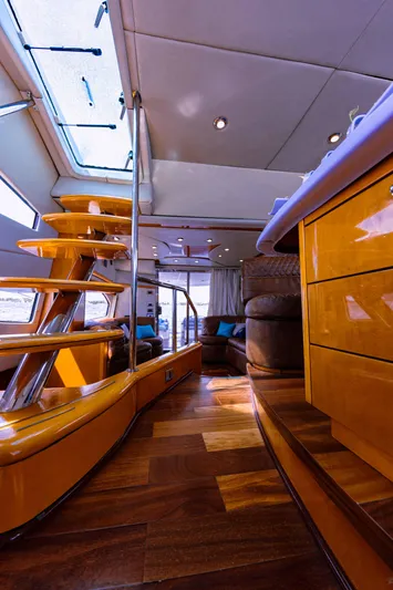 La More Yacht Photos Pics Luxurious interior of 2004 Sunseeker Manhattan 60 yacht with wooden flooring and modern design.