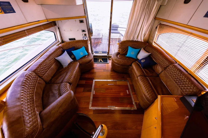 La More Yacht Photos Pics Luxurious interior of 2004 Sunseeker Manhattan 60 yacht with leather seating and ocean view.