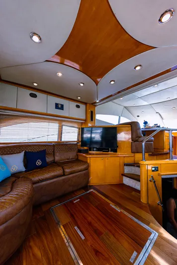 La More Yacht Photos Pics Luxurious interior of 2004 Sunseeker Manhattan 60 yacht with leather seating and wood finishes.