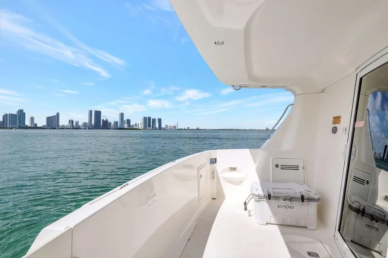  Yacht Photos Pics 2016 Silverton 43SB yacht deck with city skyline and ocean view.