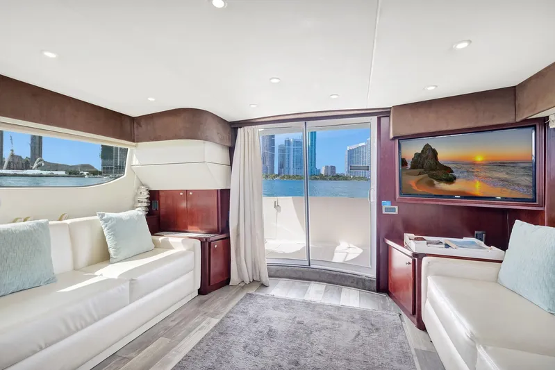  Yacht Photos Pics Luxurious interior of 2016 Silverton 43SB yacht with modern decor and waterfront view.