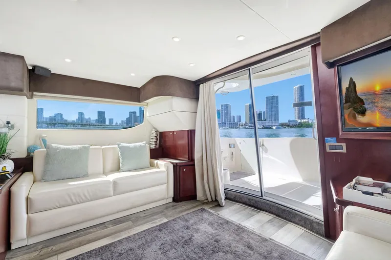  Yacht Photos Pics Luxurious interior of 2016 Silverton 43SB yacht with city skyline view.