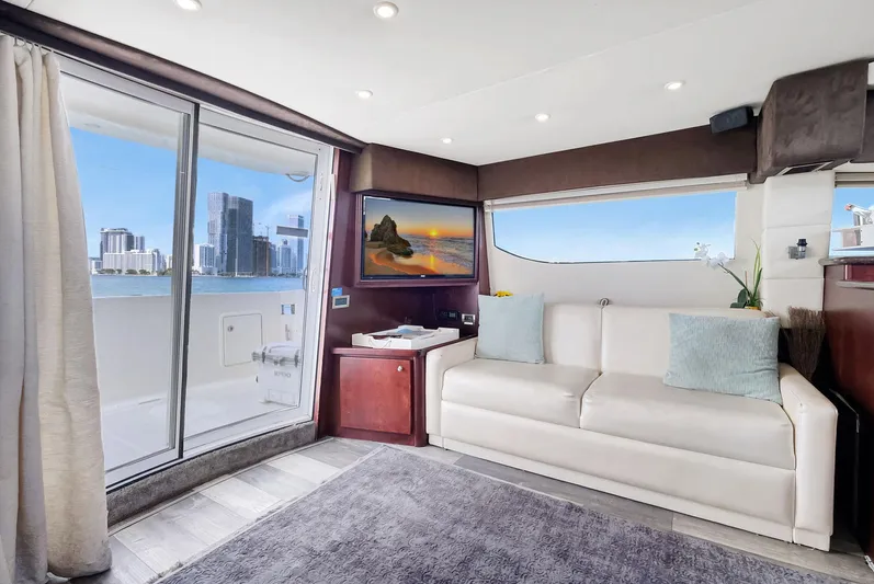  Yacht Photos Pics Luxurious interior of 2016 Silverton 43SB yacht with city skyline view.