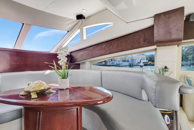  Yacht Photos Pics Luxurious interior of 2016 Silverton 43SB yacht with elegant seating and decor.