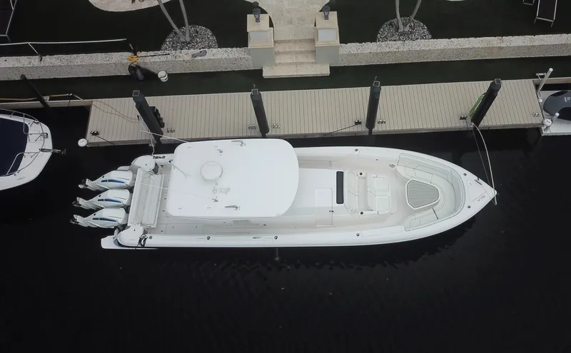  Yacht Photos Pics Aerial view of 2022 Intrepid 407 Panacea docked at a marina.