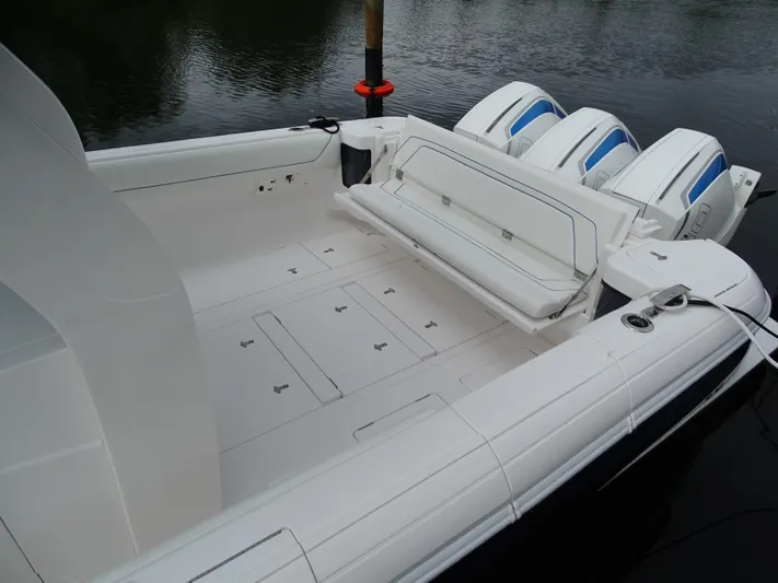  Yacht Photos Pics 2022 Intrepid 407 Panacea boat with triple outboard engines and spacious deck.