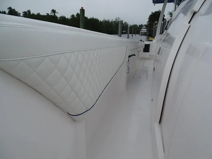  Yacht Photos Pics 2022 Intrepid 407 Panacea boat with white quilted upholstery detail.