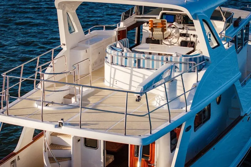  Yacht Photos Pics Luxurious 2024 Selene 49 yacht with spacious deck and elegant design on the water.