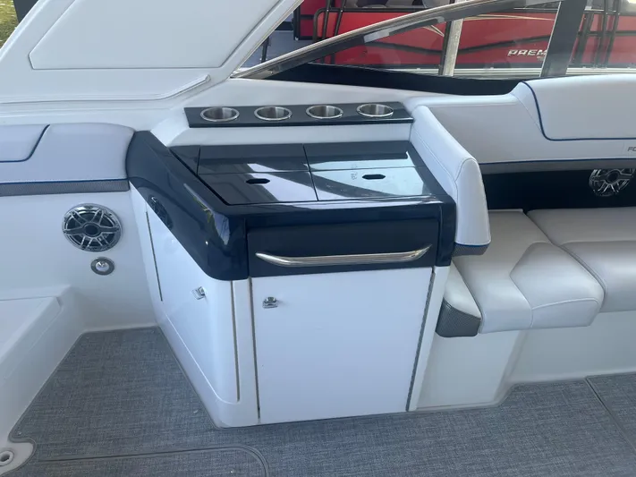  Yacht Photos Pics 2023 Formula 310 Bowrider I/O interior with seating and storage area.