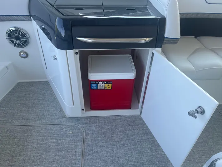  Yacht Photos Pics 2023 Formula 310 Bowrider I/O with Igloo cooler in storage compartment.