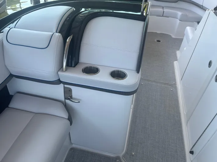  Yacht Photos Pics Interior of 2023 Formula 310 Bowrider I/O, featuring sleek seating and cup holders.