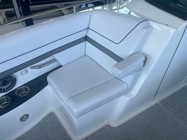  Yacht Photos Pics 2023 Formula 310 Bowrider I/O interior with white seating and cup holders.