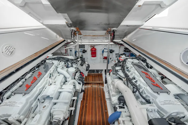 Nuts And Bolts Yacht Photos Pics Engine room of a 1998 Scopinich Custom Express boat with twin engines.