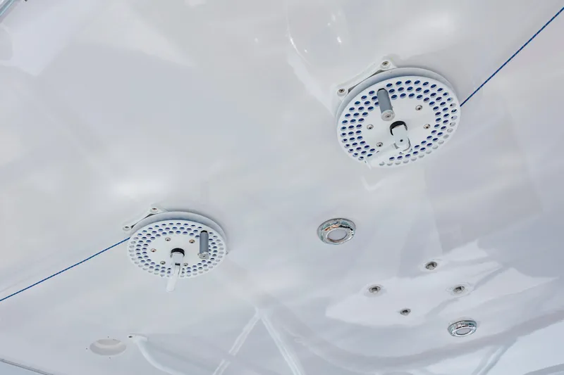 Nuts And Bolts Yacht Photos Pics Ceiling of 1998 Scopinich Custom Express boat with mounted speakers and lights.