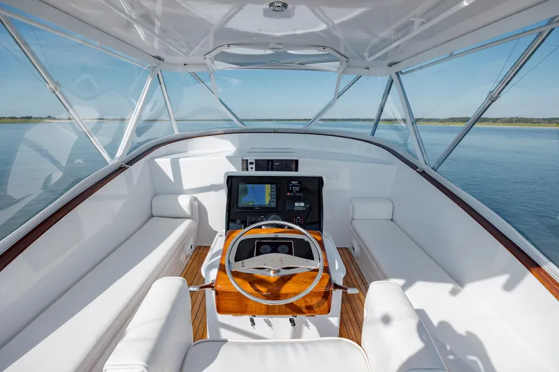 Nuts And Bolts Yacht Photos Pics 1998 Scopinich Custom Express boat helm with modern navigation equipment and panoramic water view.