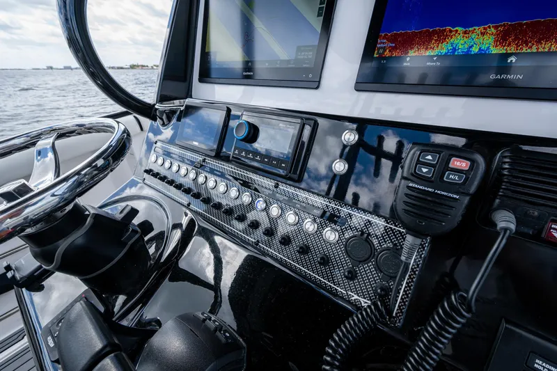 Floating Stones Yacht Photos Pics Control panel of 2022 Tidewater 292 CC Adventure boat with advanced navigation systems.