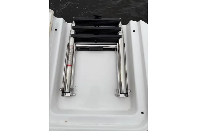  Yacht Photos Pics Folded boat ladder on 2025 Monterey Elite 27 OB deck.