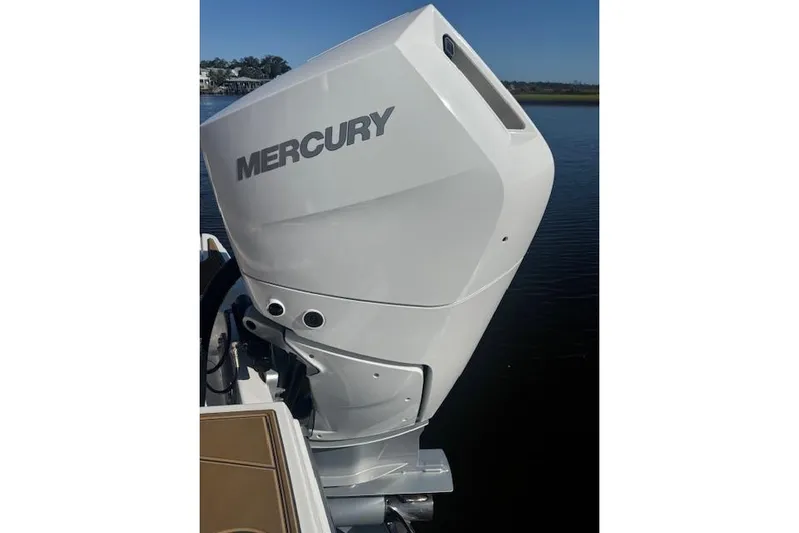  Yacht Photos Pics 2025 Monterey Elite 27 OB with Mercury outboard engine on water.
