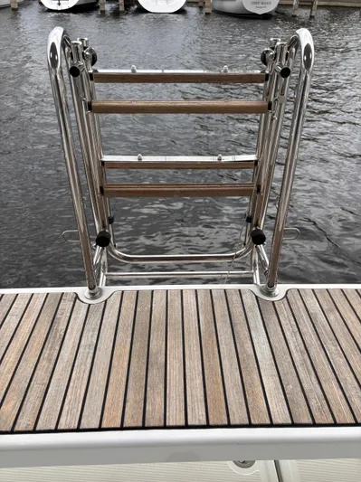 Private Sessions Yacht Photos Pics Stainless steel swim ladder on 2018 Beneteau Oceanis 45 yacht, dockside view.