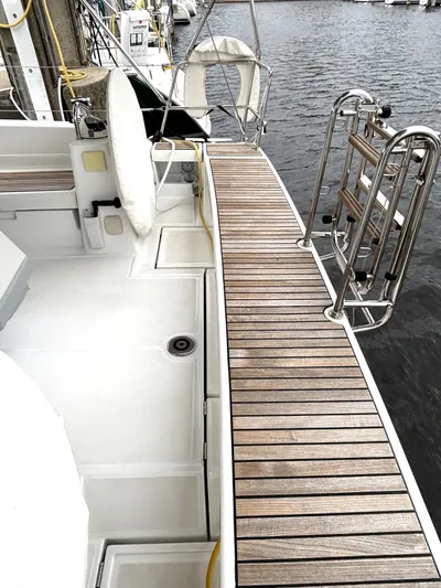 Private Sessions Yacht Photos Pics Beneteau Oceanis 45 yacht deck with wooden finish, docked at marina, 2018 model.