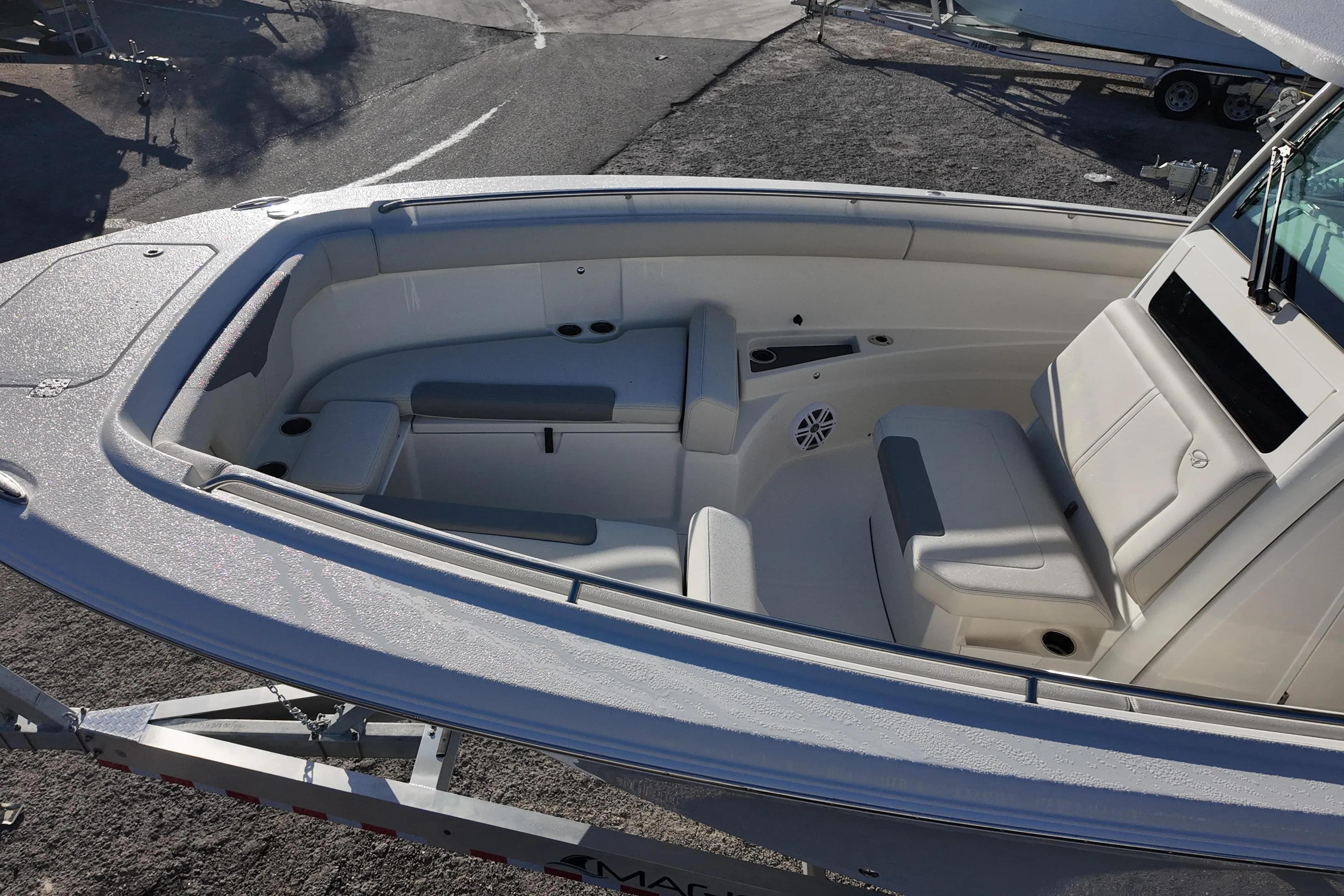2026 Sailfish 312 CC boat interior with cushioned seating and modern design.
