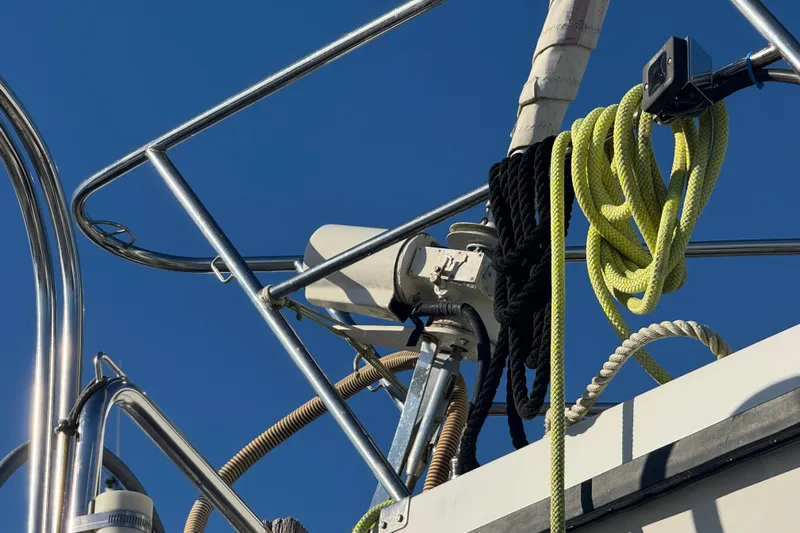 Fiasco Yacht Photos Pics Close-up of 1988 Amel Sharki yacht rigging and ropes against clear blue sky.