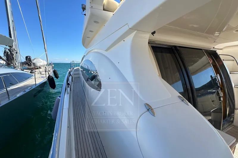  Yacht Photos Pics 2009 Azimut 68E yacht docked, showcasing sleek design and luxurious exterior.