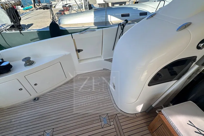  Yacht Photos Pics 2009 Azimut 68E yacht deck with sleek design and wooden flooring.