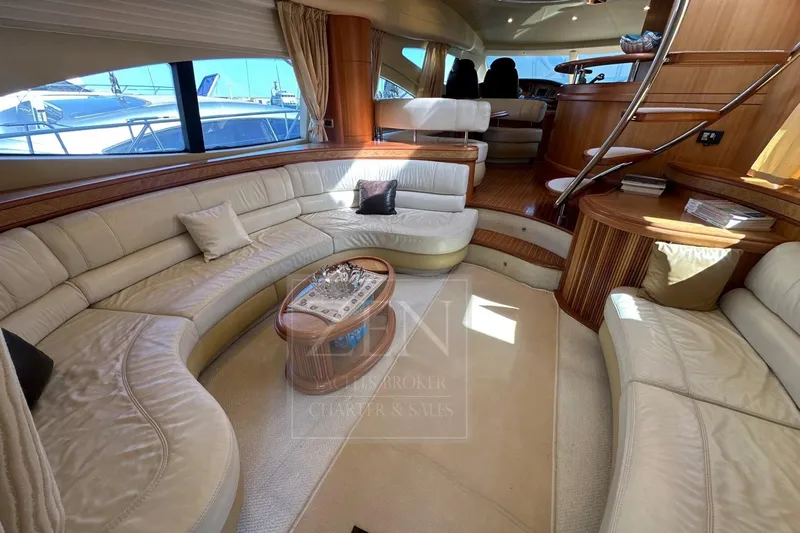  Yacht Photos Pics Luxurious interior of 2009 Azimut 68E yacht with elegant seating and wooden accents.