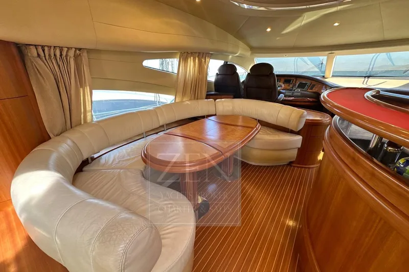  Yacht Photos Pics Luxurious interior of 2009 Azimut 68E yacht with elegant seating and wooden finishes.