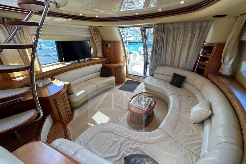  Yacht Photos Pics Luxurious interior of 2009 Azimut 68E yacht with elegant leather seating and modern amenities.