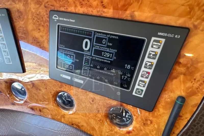  Yacht Photos Pics Dashboard of a 2009 Azimut 68E yacht showing engine metrics and controls.