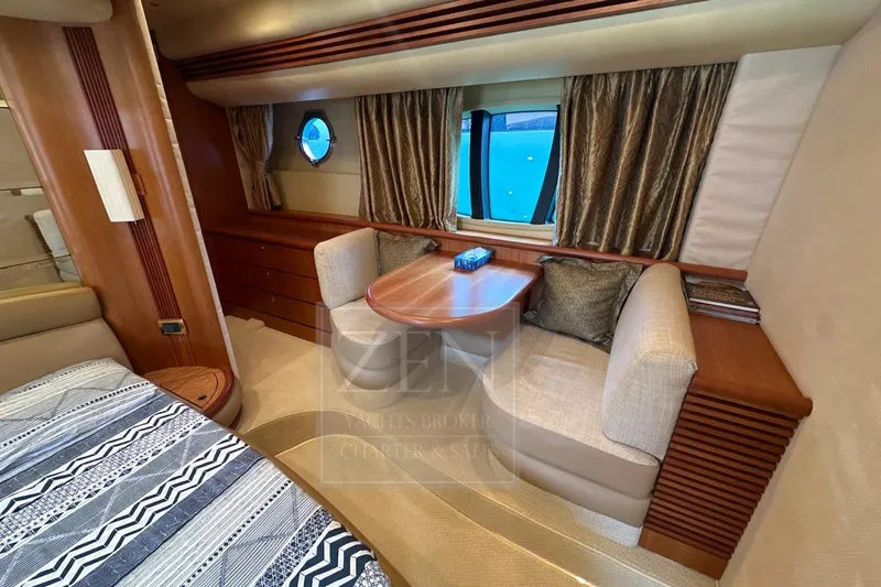  Yacht Photos Pics Luxurious interior of 2009 Azimut 68E yacht with elegant seating and window view.